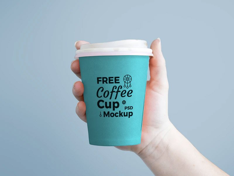 Takeaway Coffee Cup in Hand - Free Mockup