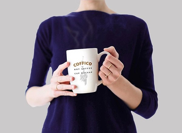 Woman Holding a Coffee Mug Mockup